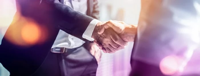 Two businessmen shaking hands