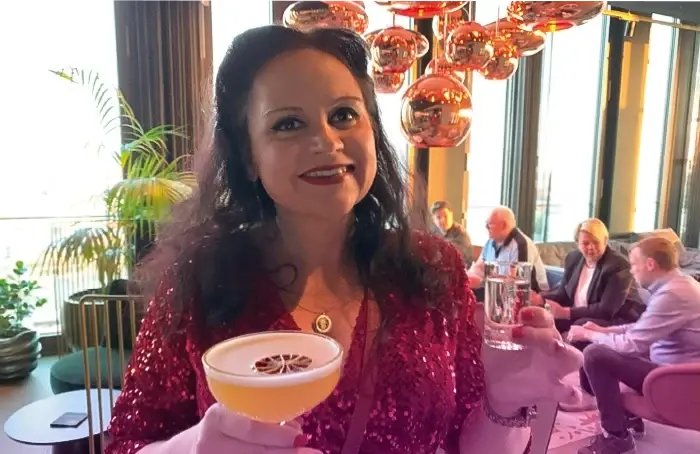 Daniela Gröbel-Becker, CMO of COREDINATE at the BVMS anniversary celebration in the Skybar in Nuremberg.